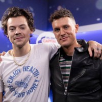 Harry Styles and Jimmy Hill backstage in the on air studio during day one of Capital's Jingle Bell Ball with Seat at London's O2 Arena.