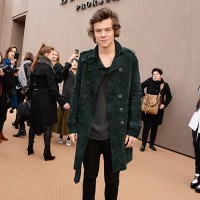 Harry Styles arrives at Burberry Womenswear Autumn/Winter 2014 at Kensington Gardens on February 17, 2014 in London, England.