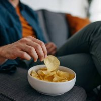 having snack - junk food stock pictures, royalty-free photos & images