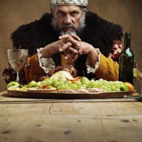 he feasts while the serfs starve - food stock pictures, royalty-free photos & images
