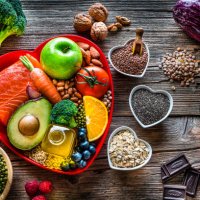 healthy food for lower cholesterol and heart care shot on wooden table - food stock pictures, royalty-free photos & images
