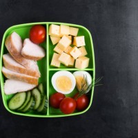 healthy protein snack box with chicken breast, cheese, hardboiled eggs - food stock pictures, royalty-free photos & images