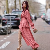 Heart Evangelista wears dark pink long sleeve wrapped Elie Saab maxi dress, dark pink embroidered dress, light brown knee high slouchy platform...