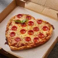 heart shaped pepperoni pizza - junk food stock pictures, royalty-free photos & images