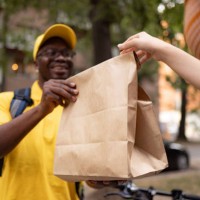 here's your delivery! - junk food stock pictures, royalty-free photos & images
