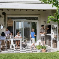 hispanic family enjoying outdoor midday meal - home decoration stock pictures, royalty-free photos & images