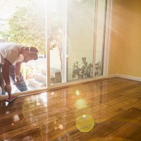 hispanic man refinishing floors in new house - home decoration stock pictures, royalty-free photos & images