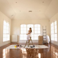 hispanic woman painting room - home decoration stock pictures, royalty-free photos & images