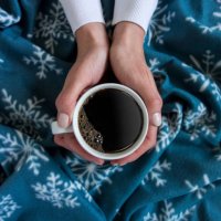 holding a cup of coffee - coffee stock pictures, royalty-free photos & images