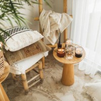 home decoration with burning candles on wooden coffee table in bright and cozy living room. - home decoration stock pictures, royalty-free photos & images