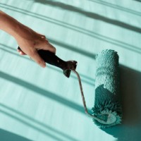 home improvement diy roller painting a wall - home decoration stock pictures, royalty-free photos & images