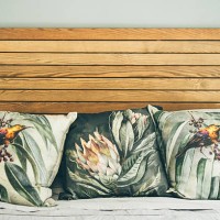 home interior. bed with colored cushions. - home decoration stock pictures, royalty-free photos & images