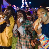 hot dogs taste better at the funfair - junk food stock pictures, royalty-free photos & images