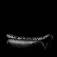 hotdog on black backdrop - junk food stock pictures, royalty-free photos & images