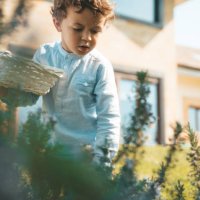 hunting for easter eggs - garden decoration stock pictures, royalty-free photos & images