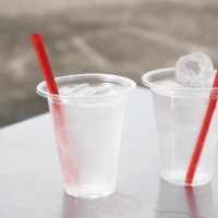 ice water in plastic cup - junk food stock pictures, royalty-free photos & images