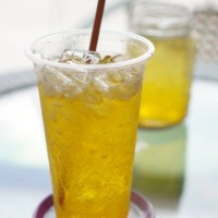 ice yuzu soda in plastic cup - junk food stock pictures, royalty-free photos & images