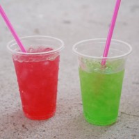 iced red soda in plastic cup - junk food stock pictures, royalty-free photos & images