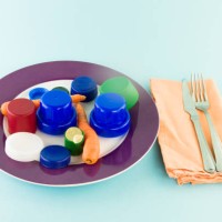 if we don't keep the sea free of plastic, we'll end up eating it - junk food stockfoto's en -beelden