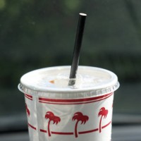 In this photo illustration, a paper straw is seen in a fast food drink cup on February 07, 2025 in Studio City, California. U.S. President Donald...