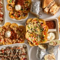 indian fusion food table. - junk food stock pictures, royalty-free photos & images