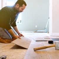 installing wooden vinyl floor - home decoration stock pictures, royalty-free photos & images