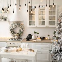 interior white kitchen with christmas decor and decorated fir tree. - home decoration stock pictures, royalty-free photos & images