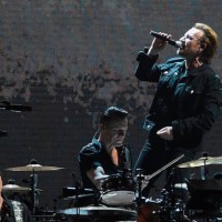 Irish rock band U2 perform during a concert at the D.Y. Patil stadium in Navi Mumbai on December 15, 2019.