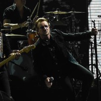 Irish rock band U2 singer Bono performs during a concert at the D.Y. Patil stadium in Navi Mumbai on December 15, 2019.