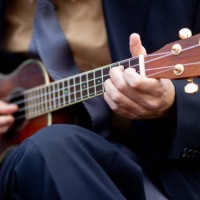 jamming on a tenor guitar - concert stock pictures, royalty-free photos & images