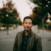japanese man looking at camera at dusk, tokyo - fashion stock pictures, royalty-free photos & images