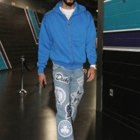 Jayson Tatum of the Boston Celtics arrives to the arena before the game against the Charlotte Hornets on April 1, 2024 at Spectrum Center in...