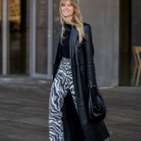 Jeanette Friis Madsen wears black leather coat, zebra print pants, black bag outside OpéraSport during the Copenhagen Fashion Week AW24 on January...