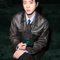 Jin attends the Gucci - Women's Fall/Winter 2025/2026 Fashion Show during the Milan Fashion Week Womenswear Fall/Winter 2025/2026 on February 25,...