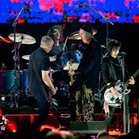 Joan Jett performs onstage with Pat Smear, Dave Grohl, and Krist Novoselic of Nirvana during the FIREAID Benefit Concert for California Fire Relief...