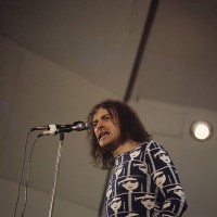 Joe Cocker performs on stage at Crystal Palace Bowl in London, England on June 03 1972.