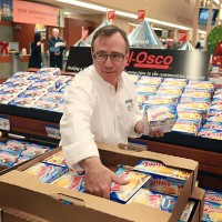 John Kolton stocks a display of Hostess snacks at a Jewel-Osco grocery store on December 11, 2012 in Chicago, Illinois. The Jewel-Osco grocery store...