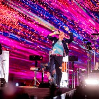 Jonny Buckland and Chris Martin of the group Coldplay Performs at Stadio Olimpico on July 12, 2024 in Rome, Italy.