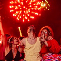 joyful group of friends dance at concert - concert stock pictures, royalty-free photos & images