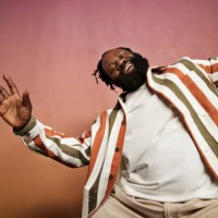 joyful man in striped shirt dancing in studio - fashion stock pictures, royalty-free photos & images