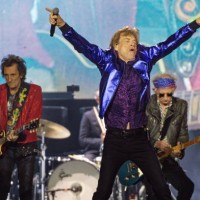 July 2022, North Rhine-Westphalia, Gelsenkirchen: Ron Wood , Mick Jagger and Keith Richards are on stage during a Rolling Stones concert at the...