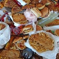 Junk food sits on a table as British Celebrity Chef Jamie Oliver announces a partnership to attack state-wide obesity on March 6, 2012 in Melbourne,...