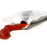 ketchup on white background - junk food stock pictures, royalty-free photos & images