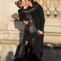 Kissing couple Carolina Dias wears black belted jacket, skirt & Ricardo Izecson dos Santos Leite, a.k.a. Kaká outside Louis Vuitton during Womenswear...