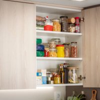 kitchen cabinet full of groceries. copy space - food stock pictures, royalty-free photos & images