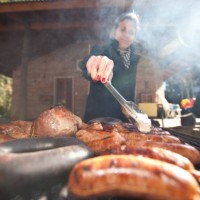 lady cooking at barbecue - food stock pictures, royalty-free photos & images