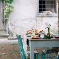 laid garden table with candles next to a cottage - garden decoration stock pictures, royalty-free photos & images