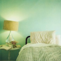lamp next to bed - home decoration stock pictures, royalty-free photos & images