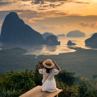 landscape of limestone karsts in phang nga bay at sunrise. unseen place of 