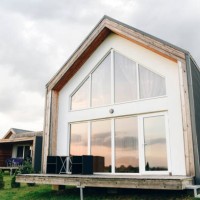 large beautiful country house with large windows. - garden decoration stock pictures, royalty-free photos & images